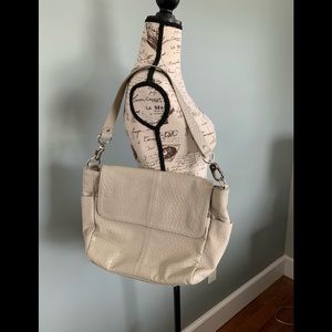 Taupe textured purse.